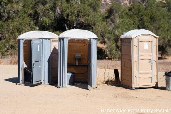 a clean row of portable restrooms for outdoor weddings or festivals in Laramie, WY